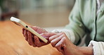 Senior, woman and hands in home with phone, typing text message and browsing internet for digital news. Old person, tech and network in house for online article, social media and app for mobile chat.