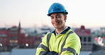 Face, architect and man in city with confidence, pride or professional with safety helmet. About us, smile or civil engineer outdoor with hard hat for ppe, development or arms crossed with bokeh