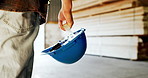 Helmet, walking and hands of man in warehouse for carpentry, inventory and distribution inspection. Supervisor, manufacturing and person with ppe for woodwork, logistics and delivery in factory