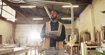 Thinking, black man and carpenter at workshop with tablet, research and inspection for wood production. Male person, walk or tech at factory for carpentry, quality control and manufacturing furniture
