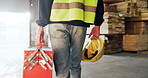 Toolbox, walking and hands of man in warehouse for carpentry, inventory and distribution inspection. Supervisor, manufacturing and person with helmet for woodwork, logistics and delivery in factory