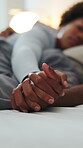 Couple, sleep and holding hands on bed, home and resting together on break and bonding with partner. Black people, connection and comfortable on weekend, nap and commitment for relationship in house