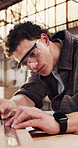 Carpentry, man or measure with ruler in workshop for cabinetry, custom design or timber size. Safety, carpenter and marking material for wood dimensions, joinery precision and furniture manufacturing