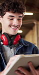 Carpenter, workshop and happy man with tablet for furniture design, inventory or wood production. Male person, carpentry or smile with technology for lumber stock or timber distribution in warehouse
