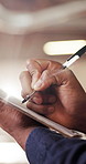 Man, hands and writing in warehouse with clipboard, manufacturing inspection and supervisor report. Flare, person and taking notes in factory with production checklist, evaluation and paperwork.