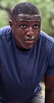 Tired, black man and sweat at park for fitness, exercise and exhausted from intense training. Thinking, athlete and male person in nature with fatigue, sports workout and runner breathe for recovery