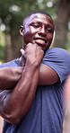 Man, stretching and partner outdoor, trainer and athlete with workout and talking in park. Person, conversation and coach for start of exercise, muscle resistance and sports training in nature