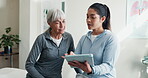 Physiotherapy, old woman or chiropractor with tablet, treatment plan or feedback in health center. Rehabilitation, senior person or practitioner with tech, digital notes or advice on patient recovery