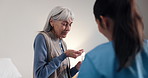 Caregiver, old woman and glass at house with medicine, prescription and pills for chronic illness. Senior person, nurse and water in home with drugs, supplements and magnesium for terminal condition