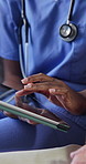Tablet, hands and caregiver with senior man in home for help, telehealth app or medical results. Retirement, pointing and nurse with elderly person on tech for report, consulting or health assistance