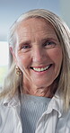 Senior, woman and happy with face in home for peaceful morning, positive attitude and healthy aging. Pensioner, elderly person or smile in house for comfortable retirement, weekend break and wellness
