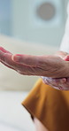 Senior, person or hands with wrist pain in home for muscle tension, discomfort or joint inflammation. Elderly, sore arm or injury with carpal tunnel syndrome for strain, pressure or fibromyalgia