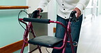 Walker, medical and hands of old woman in hospital for rehabilitation, checkup or support. Healthcare appointment, osteoporosis and walking with senior person with a disability in clinic for recovery