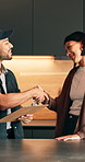 Repair, clipboard or people in home with handshake, issue review or deal on maintenance quote. Happy, client or handyman with shaking hands, inspection report or agreement on improvement invoice.