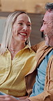 Bonding, laugh or couple on sofa with chat, funny conversation or happy moment on weekend break. Smile, gossip or people in home with humor, joke reaction or connection in healthy relationship.
