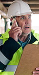 Man, clipboard and phone call on construction site for inspection, task brief or safety update. Industrial, communication and mature engineer with tech, report or project coordination for renovation