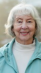 Face, senior and woman outdoor in retirement, happiness and wellness with positive attitude in old age. Person, portrait and smile with pensioner, elderly and good mood with wellbeing in nature