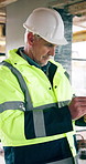 Man, engineer and writing on clipboard for construction, survey and inspection report for architecture. Mature person, reading and checklist for safety notes, compliance form and building development