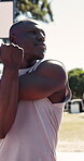 Fitness, routine or man on basketball court with stretch, arm mobility or prep for practice match. Training, start or black person with warm up, muscle improvement or injury prevention in hoop sport.