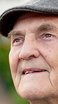Thinking, smile and senior man outdoor with insight, daydreaming and nostalgia in calm mindset. Retirement, reflection and elderly person with memory, flashback and peaceful perspective in backyard.