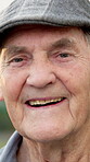Face, happy and elderly man in retirement, smile and wellness with positive attitude in old age. Male person, portrait and pensioner in good mood, wellbeing and senior citizen with calm outdoor