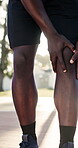 Fitness, hands or massage knee pain outdoor for muscle spasm, tissue overload or runner injury. Athlete, person or tendon discomfort at park for cardio accident, kneecap strain or patellar tendinitis
