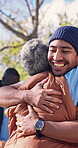 Volunteer, hug and happy with people outdoor for community service, team and ngo solidarity. Donation achievement, support and social responsibility with friends in nature for celebration and partner