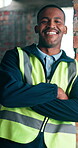 Arms crossed, engineer and face of man on construction site for about us, renovation and smile. Architect, building inspection and property developer with person for infrastructure and contractor 