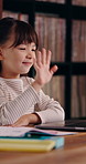 E learning, laptop or kid in home with video call, online class or intro wave on academic platform. Greeting, happy or Asian child in house with tech, digital lesson or homeschool in remote education