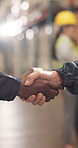 Handshake, deal and logistics employees in warehouse with partnership for distribution service. Cargo, people and supply chain worker shaking hands with manager for shipping contract in workplace.