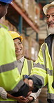 Introduction, handshake and people in warehouse together for distribution, shipping or storage. Meeting, partnership and smile with employee team shaking hands in factory for b2b collaboration