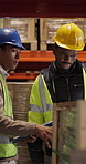 Logistics, review or team at depot with clipboard, stock control or order backlog in distribution. Discussion, men or warehouse staff with checklist, inventory management or teamwork in supply chain.