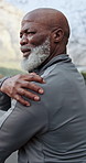 Sports, injury and black man with shoulder pain outdoor for exercise, health or active morning. Fitness, arthritis and mature person with arm muscle sprain, fibromyalgia or inflammation in nature.