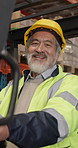 Face, logistics or man in warehouse as forklift operator, distribution or laugh in supply chain. Vehicle, mature and happy Asian person in shipping industry, inventory control or stock management