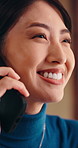 Smile, phone call and Japanese woman in home, remote work or update on publication deal. Author, mobile and happy person talking to contact for freelance information, story or manuscript feedback