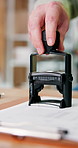 Person, hand and stamp with clipboard for logistics, inventory checklist and validation or delivery. Supply chain, distributor or supplier with document for courier confirmation, sale or depot order