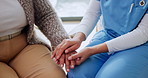 Nurse, patient and holding hands with comfort for assisted living, support or empathy in house. People, healthcare worker or caregiver with touch, sympathy or understanding for help in nursing home