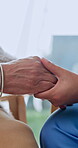 Comfort, old person and nurse in home with holding hands, understanding or empathy in health assistance. Space, senior woman and caregiver with compassion, patient support or trust in medical care.