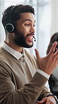 Man, headset and frustrated in call center for mistake, bad service and angry in telemarketing company. Sales agent, coworking and tech in agency for miscommunication, commission error and stress