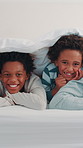Happy, face and parents with kids with blanket for wake up, relax and comfortable for weekend morning. Bedroom, family and portrait of children with mom, dad and rest for affection, love and smile