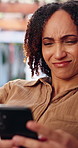 Confused, woman and reading in house with phone, unexpected news or alert for weird text message scam. Person, doubt and concern in home with tech, suspicious website and spam from social media chat.