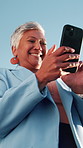 Woman, laugh and outdoor with phone for business, good news or investment opportunity in email. Low angle, reading or mature investor with mobile for notification, feedback or happy for finance goals