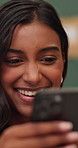 Laugh, typing and woman on sofa with phone, social media and funny chat for connection. Home, happy and person relax with mobile app for communication, internet humor and notification for message
