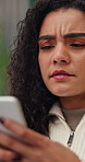 Confused, woman and stress with phone in home for fraud alert, frozen account and financial scam. Concern, person and worry with mobile app in house for phishing email, stolen funds and balance check