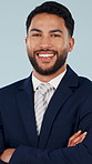 Face, happy and businessman with confidence in studio for career opportunity on a blue background. Portrait, man or lawyer with smile, pride or arms crossed in formal suit for professional job