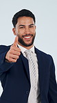 Face, thumbs up and businessman in studio with success, approval or smile for feedback on background. Like gesture, happy employee and person with corporate recommendation, laugh or agreement emoji