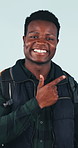 Face, hiking and pointing with black man in studio for feedback, recommendation or review. Perfect, smile and trekking with happy hiker on white background for exercise, fitness or wellness activity