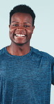 Face, weights and black man in studio for exercise, fitness and bodybuilder workout for muscle strength. Happy, portrait and person with dumbbells, strong biceps and training on blue background