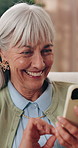 Cellphone, relax and senior woman on sofa in home for texting, research or chatting on mobile app. Happy, phone and elderly person in retirement with reading blog, website or social media in house.