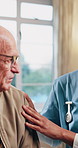 Nurse, consultation and talking with senior patient for health advice or visit in retirement house. Woman, healthcare worker or caregiver with old man for elderly care, trust or help in nursing home